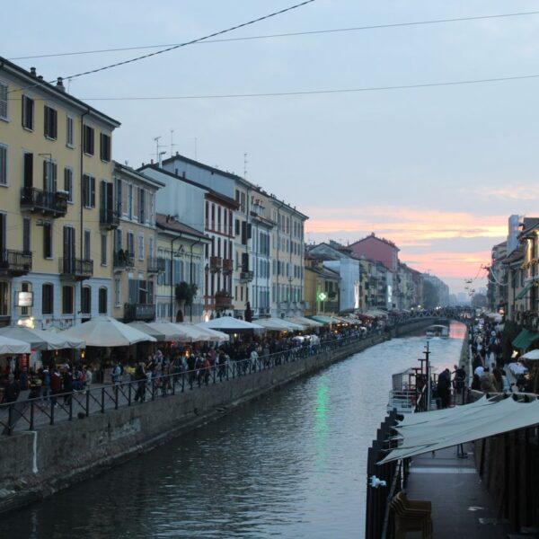 Navigli Scenic evening view of Naviglio Grande canal in Milan with vibrant street life.